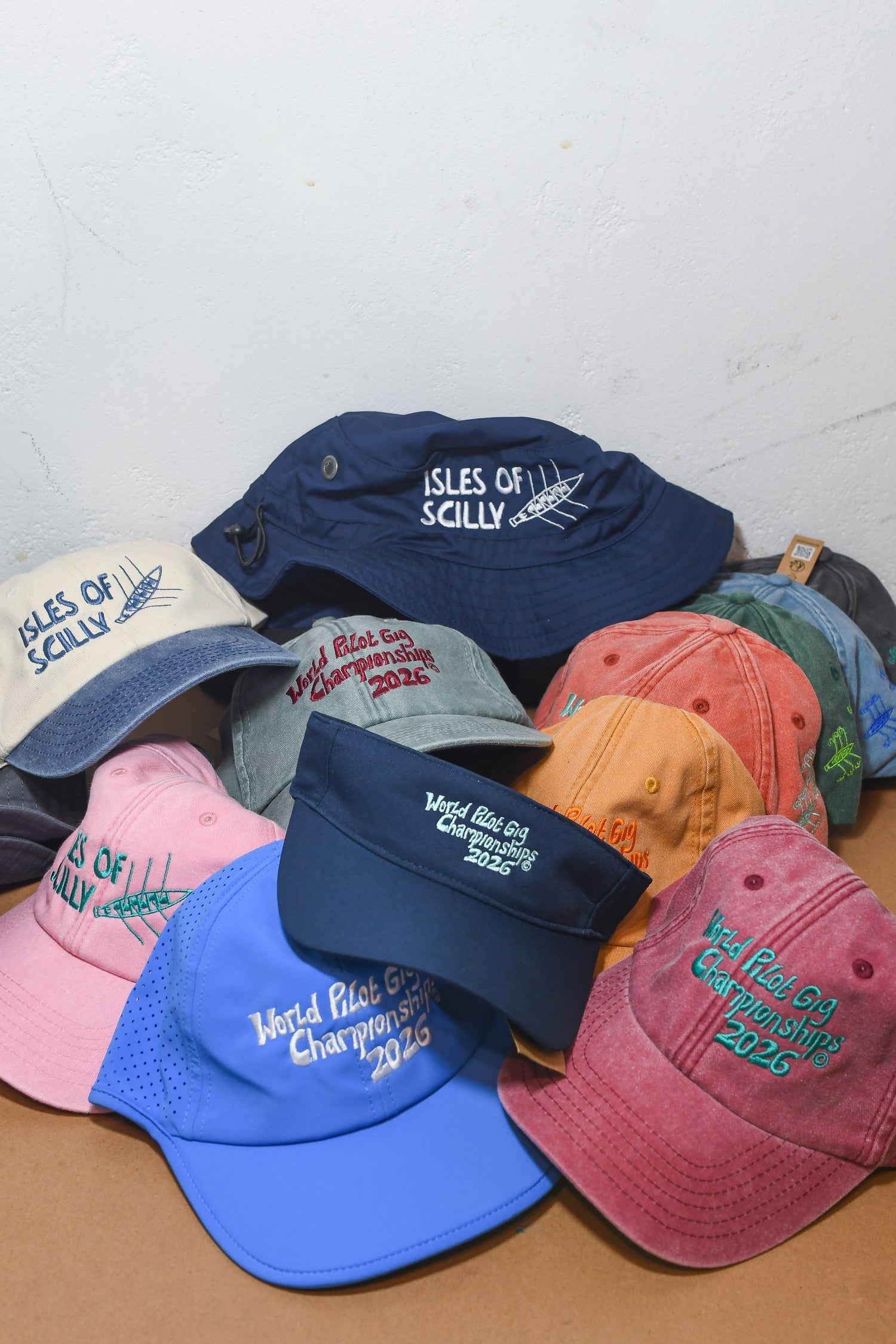 Collection of embroidered colorful baseball caps, hats, headwear, beanies 